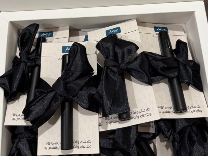 Mini Perfume Spray Favor (Card + Black Ribbon) 7 Bulk box of mini perfume favors (black cases) with black ribbon in Kuwait